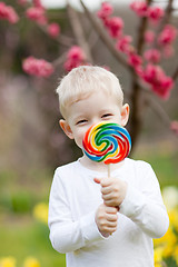 Image showing toddler with lollipop