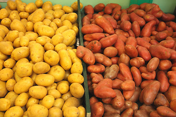 Image showing pile of potatoes on a market stall