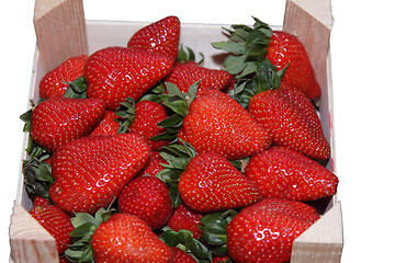 Image showing crate of strawberries isolated on white background