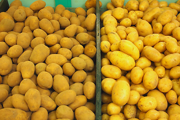 Image showing pile of potatoes on a market stall