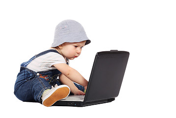 Image showing Little boy with a laptop