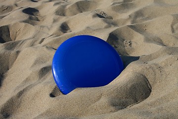 Image showing Frisbee in sand
