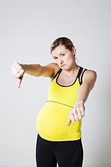 Image showing Pregnant woman thumbs down