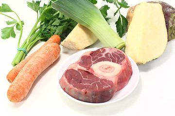 Image showing fresh raw leg slice with soup vegetables