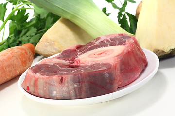 Image showing raw leg slice with soup vegetables
