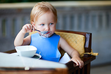 Image showing Girl having breakfast