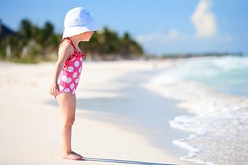 Image showing Little girl at tropical beach