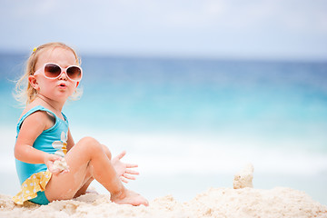 Image showing Little girl at tropical beach