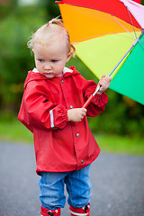 Image showing Portrait of toddler girl with umbrella