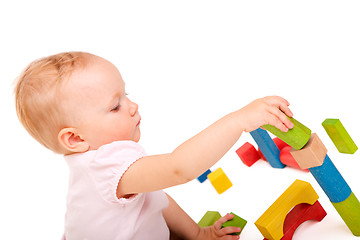 Image showing Girl playing with blocks