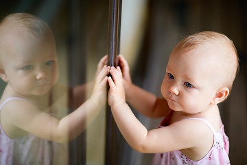 Image showing Outdoor casual portrait of baby girl