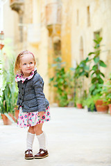 Image showing Little girl portrait outdoors