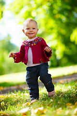 Image showing Baby girl walking