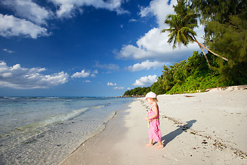 Image showing Little girl on tropical beach