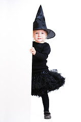 Image showing Little witch with banner