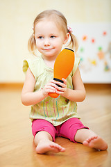 Image showing Toddler girl playing