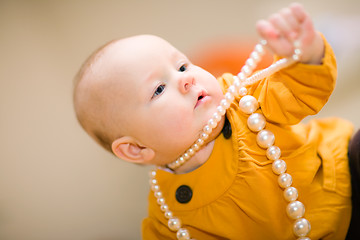 Image showing Girl and Beads