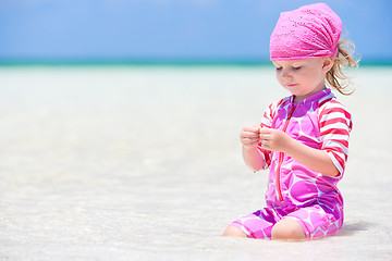 Image showing Little girl at tropical beach