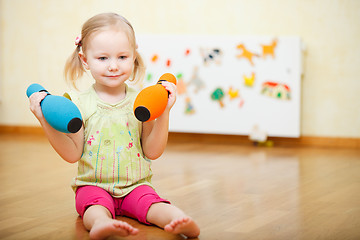 Image showing Toddler girl playing