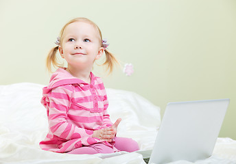 Image showing Little girl with laptop