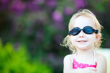 Image showing Adorable toddler girl in swimming glasses