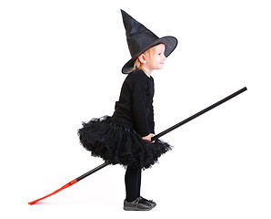 Image showing Little witch on broomstick