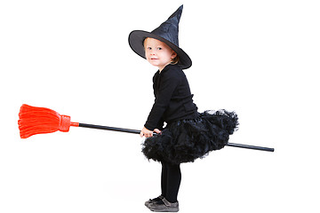 Image showing Little witch on broomstick