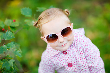 Image showing Cute girl in autumn park