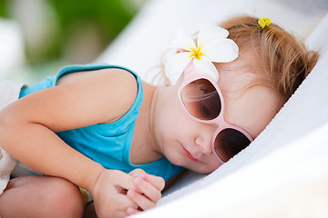 Image showing Little girl resting at beach