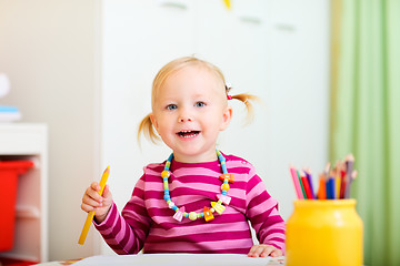 Image showing Toddler girl drawing