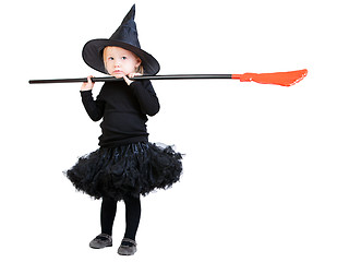 Image showing Little witch with broomstick