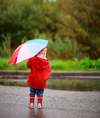 Image showing Toddler girl with umbrella