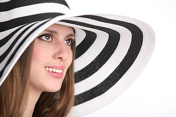 Image showing beautiful smiling girl in striped hat