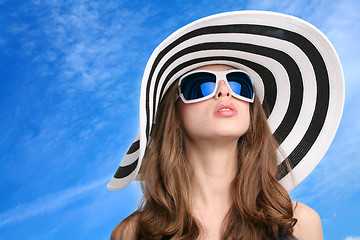 Image showing beautiful girl in striped hat