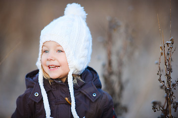 Image showing Little girl outdoors on winter day