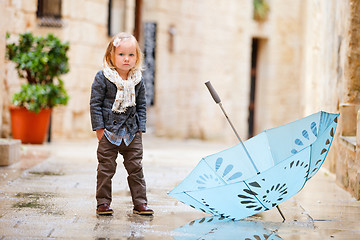 Image showing Little girl on rainy day