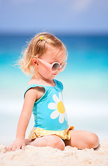 Image showing Little girl at tropical beach