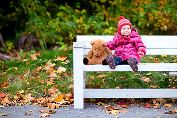 Image showing Toddler girl outdoors on autumn day