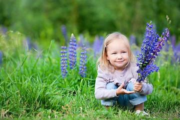 Image showing Little girl in meadow