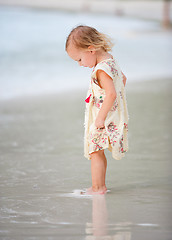 Image showing Little girl on tropical beach