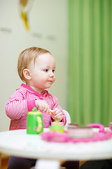 Image showing Toddler girl playing at home