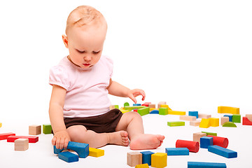 Image showing Girl playing with blocks