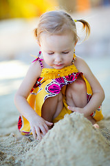 Image showing Little girl playing at beach