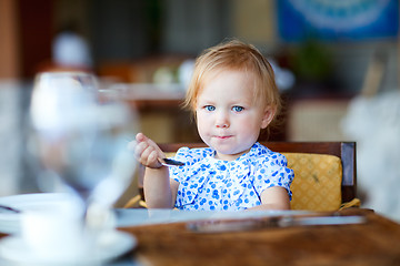 Image showing Girl having breakfast