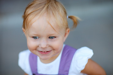 Image showing Closeup portrait of adorable playful girl