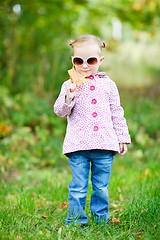 Image showing Cute girl in autumn park