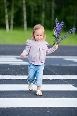 Image showing Little girl crossing road