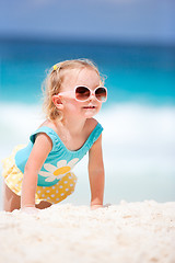 Image showing Little girl at tropical beach