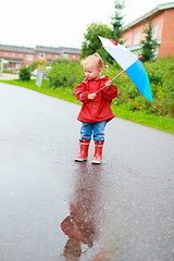 Image showing Toddler girl with umbrella