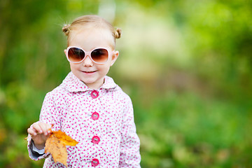 Image showing Cute girl in autumn park